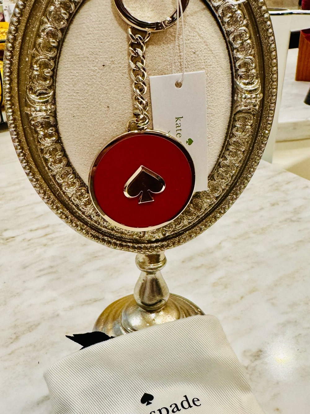 kate spade red enamel spade keyring